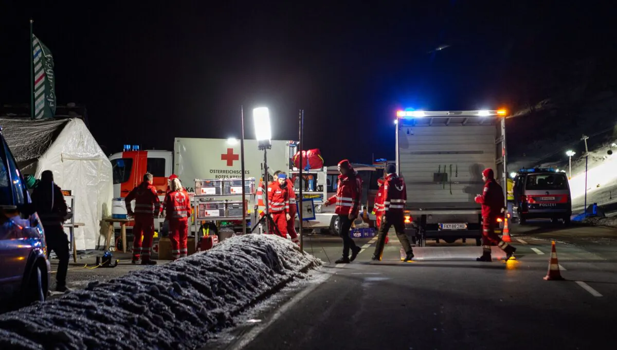Rescuers work at the ski resort of Lech Zurs in Zurs, eastern Austria, on Dec. 25, 2022. (Peter Rinderer/Expa/AFP via Getty Images)