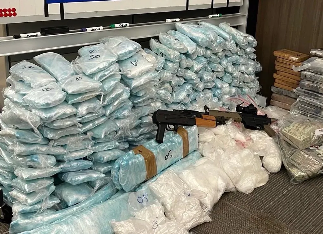 Fentanyl, firearms, and cash confiscated by DEA Los Angeles. (Courtesy of DEA in Los Angeles)