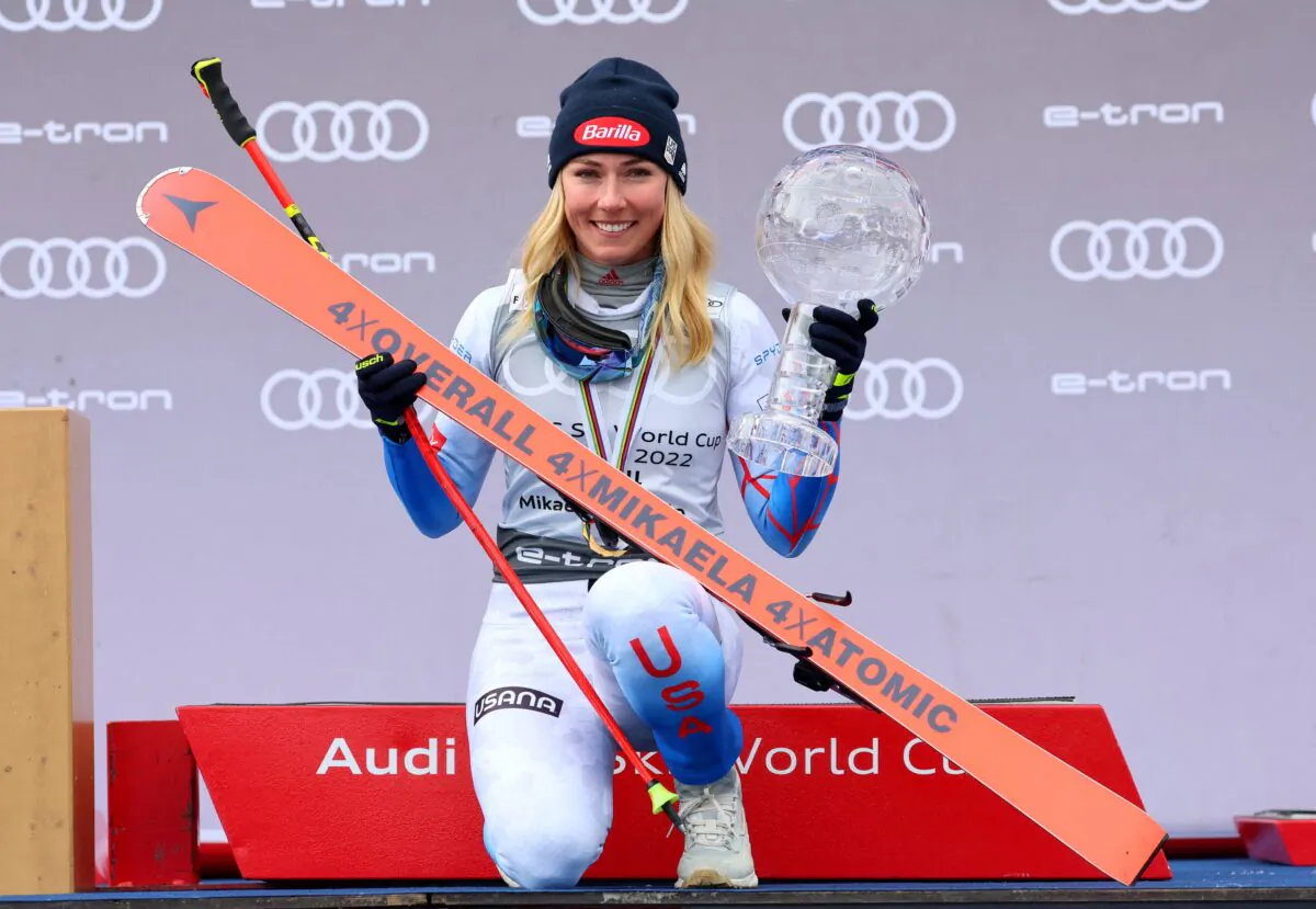 Mikaela Shiffrin of the United States celebrates on the podium after winning the overall Globe trophy during the Alpine Skiing - FIS Alpine Ski World Cup event in Meribel, France, on March 20, 2022. (Denis Balibouse/Reuters)