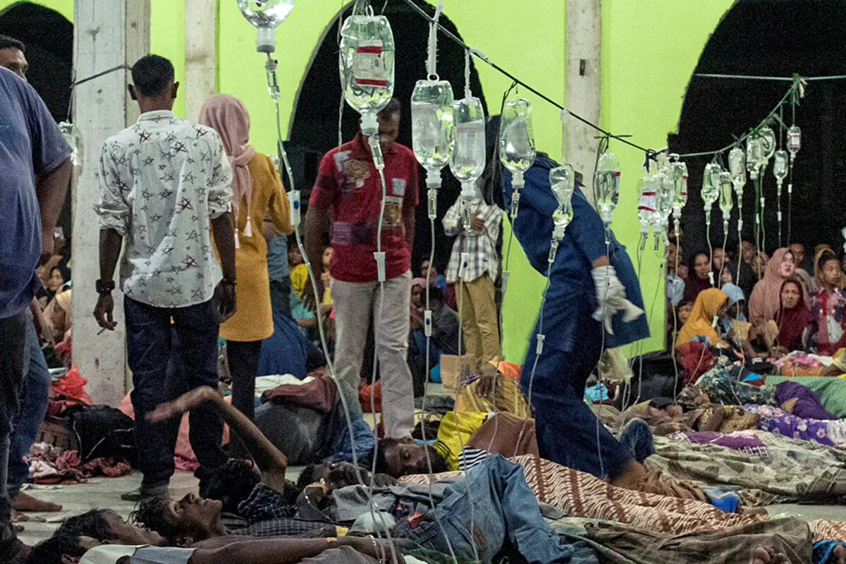 Rohingya refugees receive medical treatment at a temporary shelter in Pidie, Aceh province, Indonesia, on Dec. 26, 2022. (Antara Foto/Joni Saputra/via Reuters)