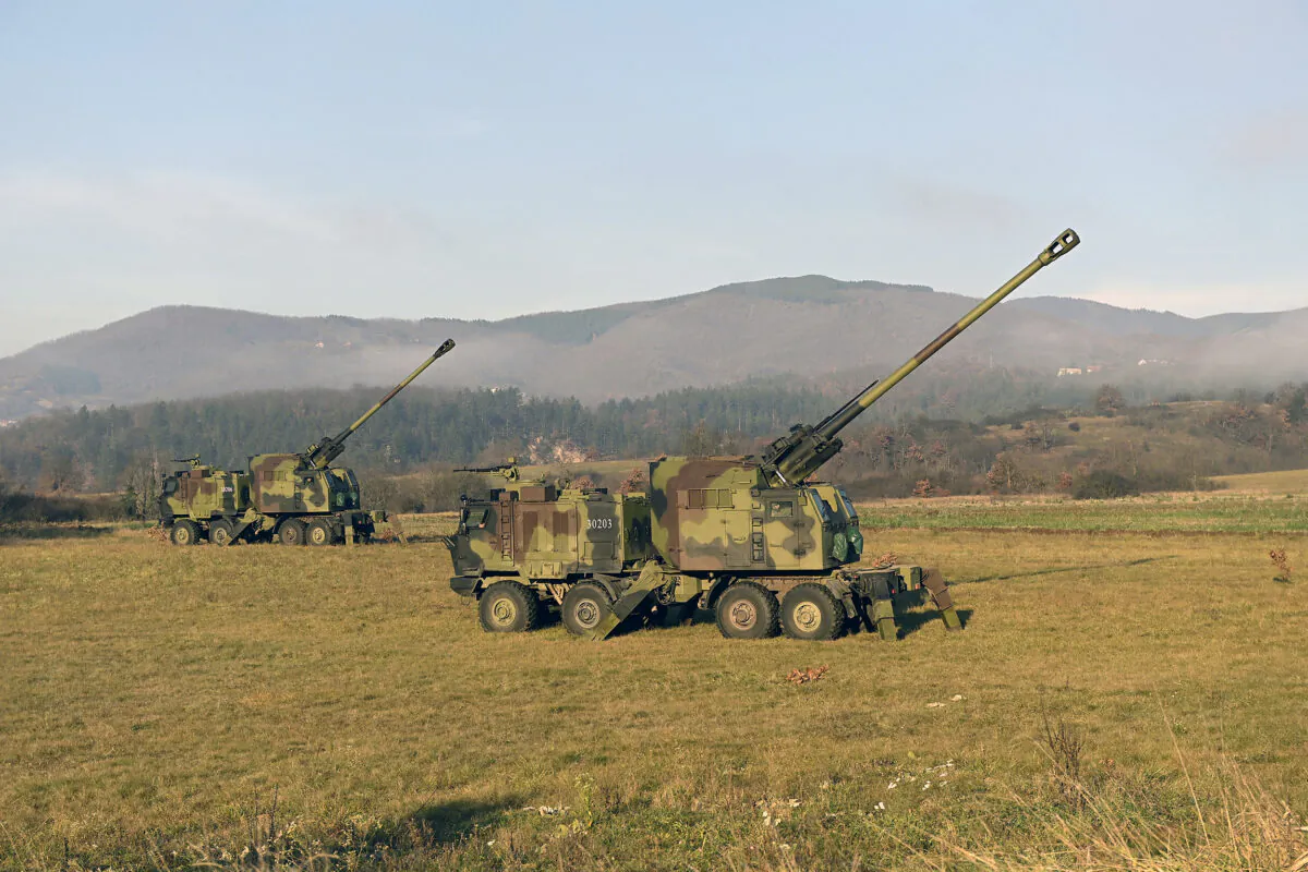 Serbian army self-propelled 155 mm gun-howitzers on position near administrative line with Kosovo, south Serbia, on Dec. 26, 2022. (Serbian Defense Ministry Press Service via AP)