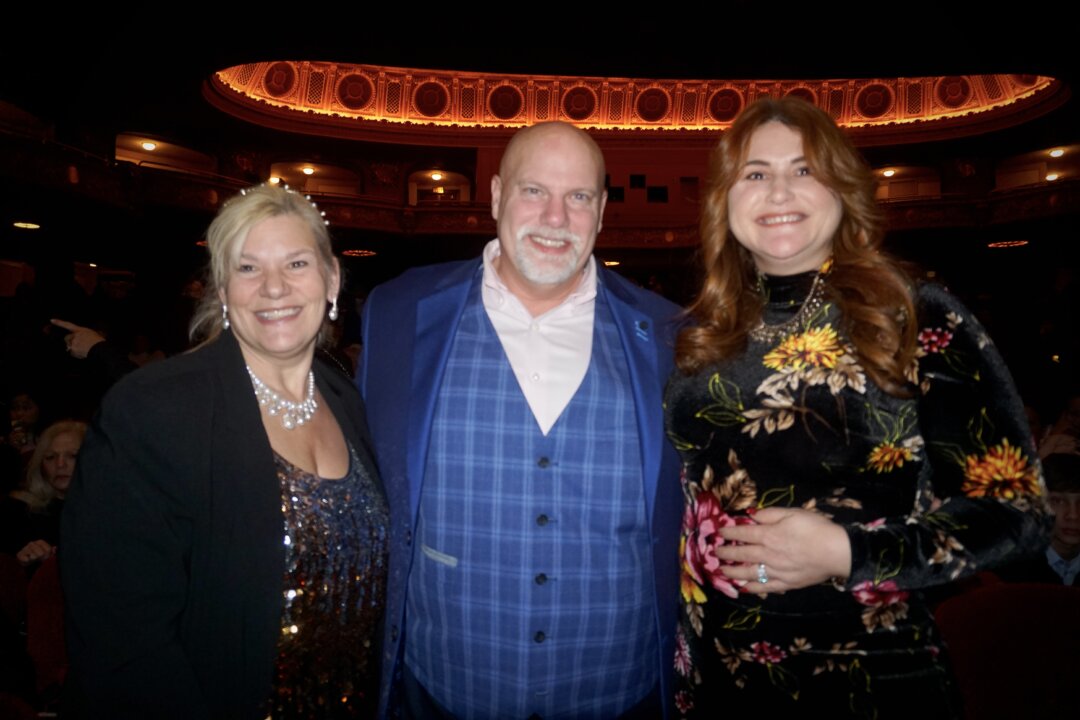 Clayton English (C) with his family at the Shen Yun Performing Arts performance at Boch Center Wang Theatre, Boston, Mass., on Dec. 27, 2022. (Yawen Hung/The Epoch Times)