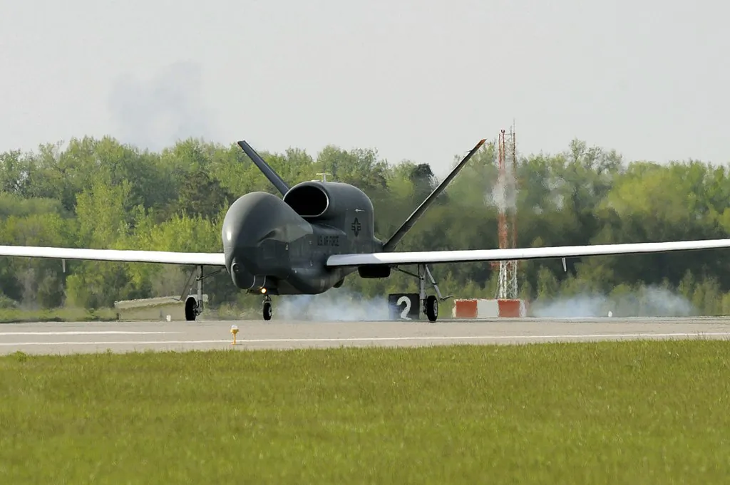 An RQ-4 Global Hawk drone lands at Grand Forks Air Force Base. (Johnny Saldivar/Wikimedia Commons)