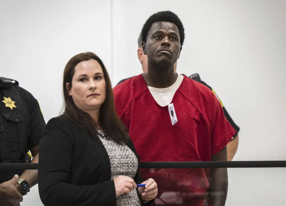 Wesley Brownlee stands with public defender Allison Nobert during his arraignment in San Joaquin County Superior Court on Oct. 18, 2022. (Hector Amezcua/The Sacramento Bee via AP)