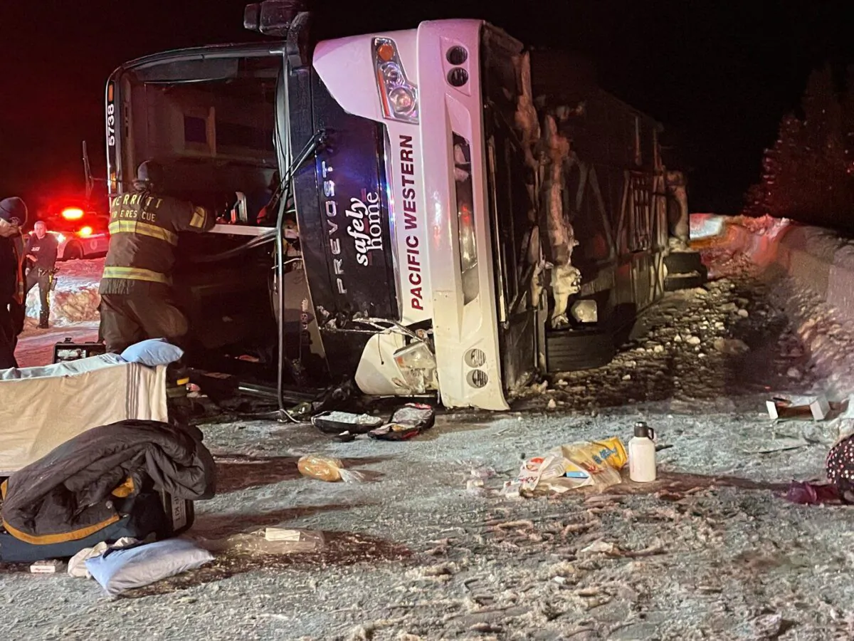 First responders look over the scene of a bus crash on Highway 97C Okanagan Connector between Merritt and Kelowna in this Dec. 24, 2022 handout photo. (The Canadian Press/HO, Bill Gerber)
