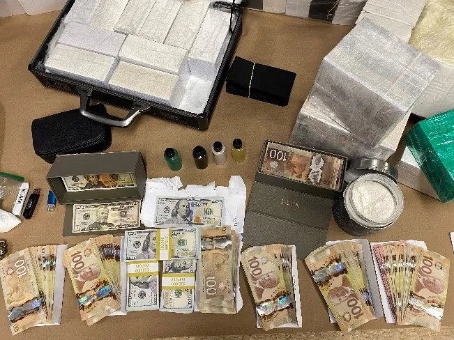 Counterfeit and Canadian currency are pictured in an undated photo. (Courtesy of Toronto Police Service)