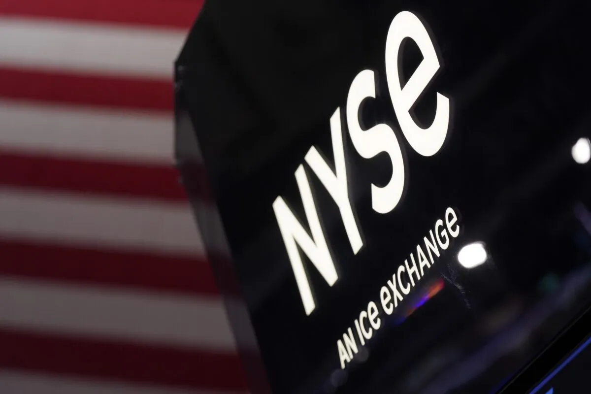 An NYSE sign is displayed at the New York Stock Exchange in New York on Nov. 28, 2022. (Seth Wenig/AP Photo)
