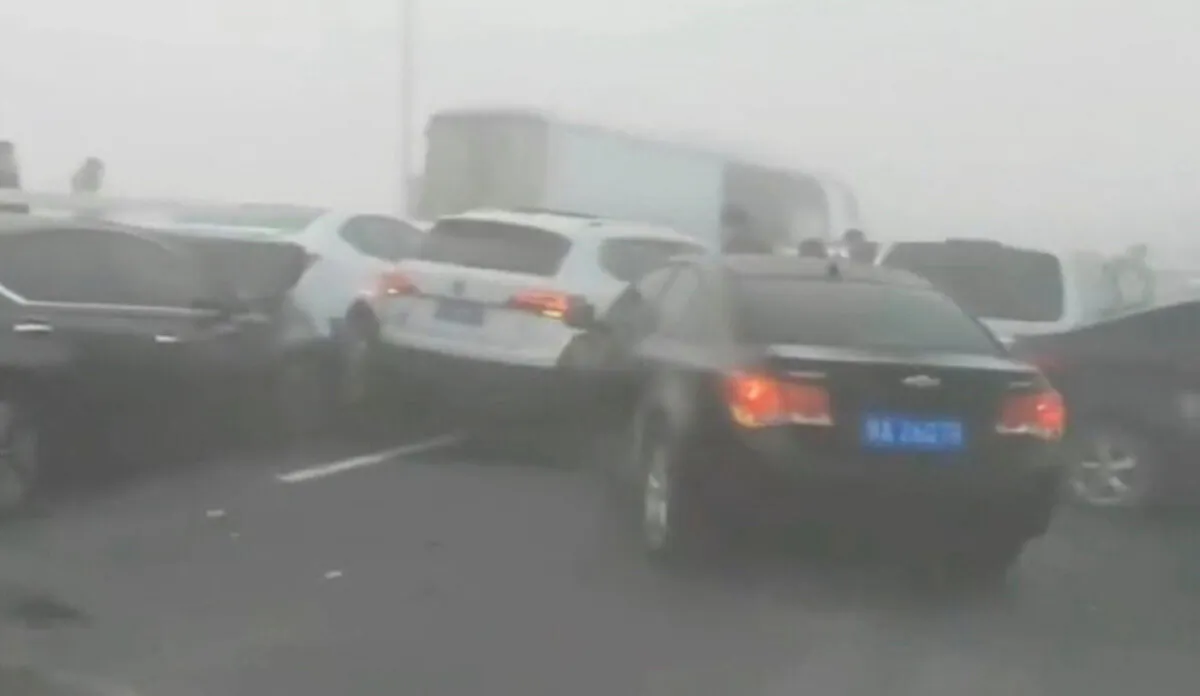 Cars crash in a pileup on a bridge in Zhengzhou, Henan province, China, in this screen grab obtained from a social media video released on Dec. 28, 2022. (Video obtained by Reuters)