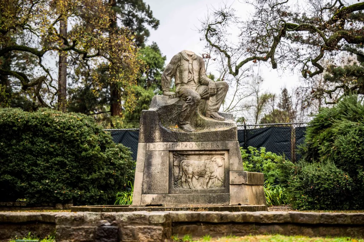 The historic statue of Charles Swanston, its head recently decapitated, stands in William Land Park in Sacramento, Calif., on Dec. 27, 2022. (Hector Amezcua/The Sacramento Bee via AP)
