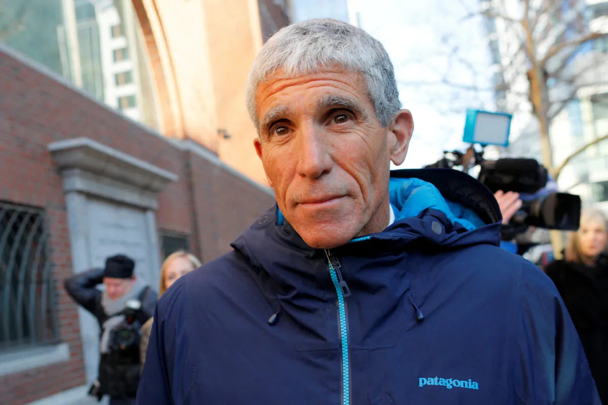 William "Rick" Singer leaves the federal courthouse after facing charges in a nationwide college admissions cheating scheme in Boston on March 12, 2019. (Brian Snyder/Reuters)