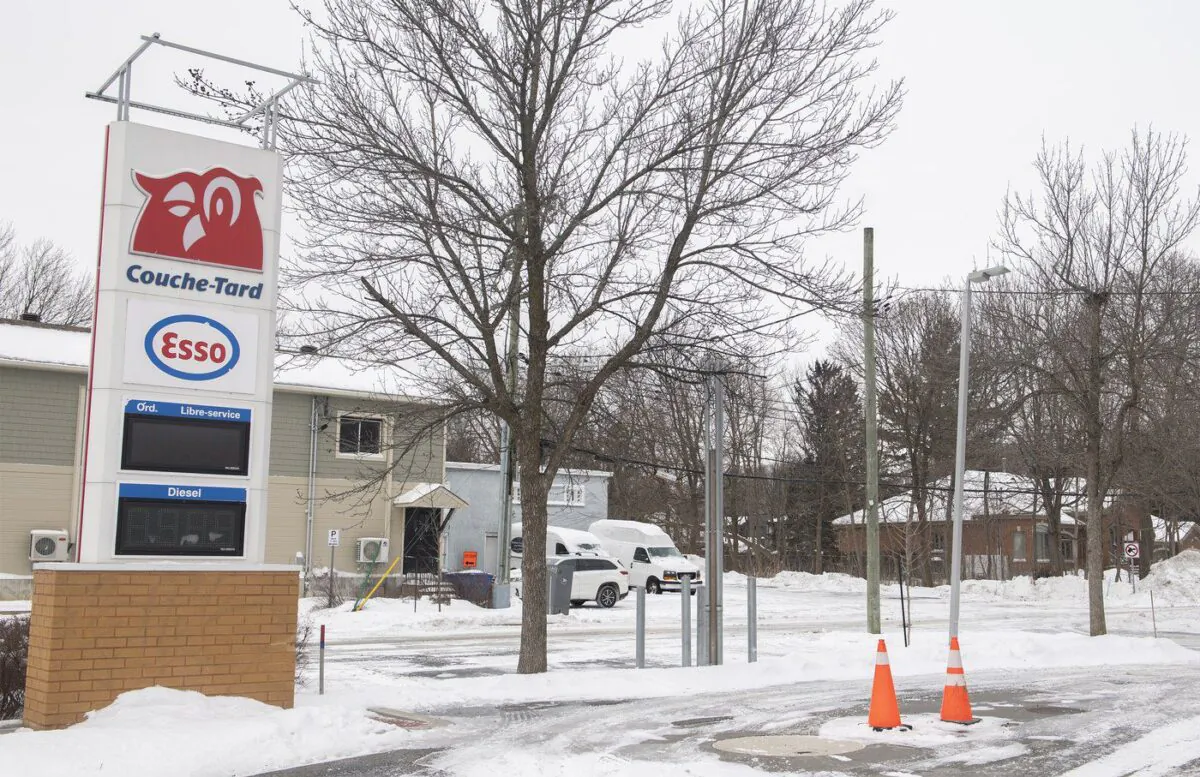 A gas station is shown without power in Montreal, Dec. 24, 2022, following a winter storm in the region. (The Canadian Press/Graham Hughes)
