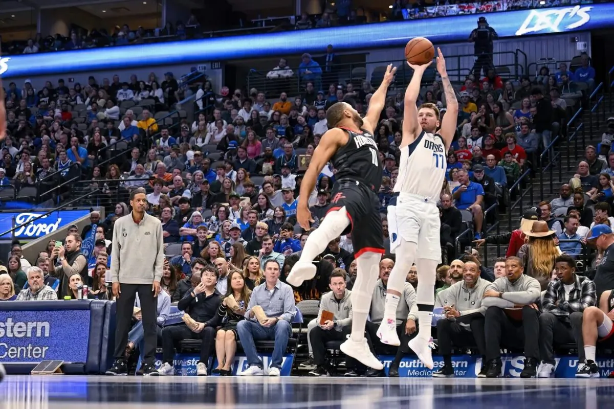 Dallas Mavericks guard Luka Doncic (77) shoots over Houston Rockets guard Eric Gordon (10) during the second half at the American Airlines Center Dallas on Dec. 29, 2022. (Jerome Miron/USA TODAY Sports via Field Level Media)
