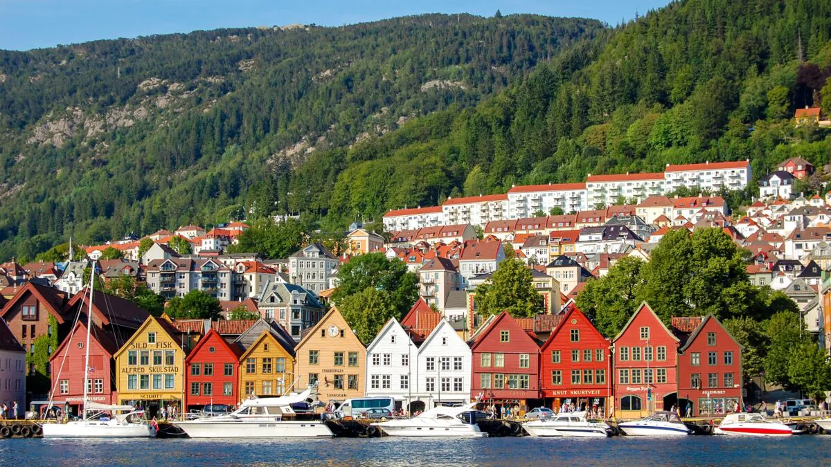 The colorful and somewhat tipsy old wooden commercial buildings of Bryggen line Bergen's harborfront. Bryggen dates to medieval times when it was one of four principal trading posts in the Hanseatic League, a German-run trade confederation extending across northern and central Europe.
