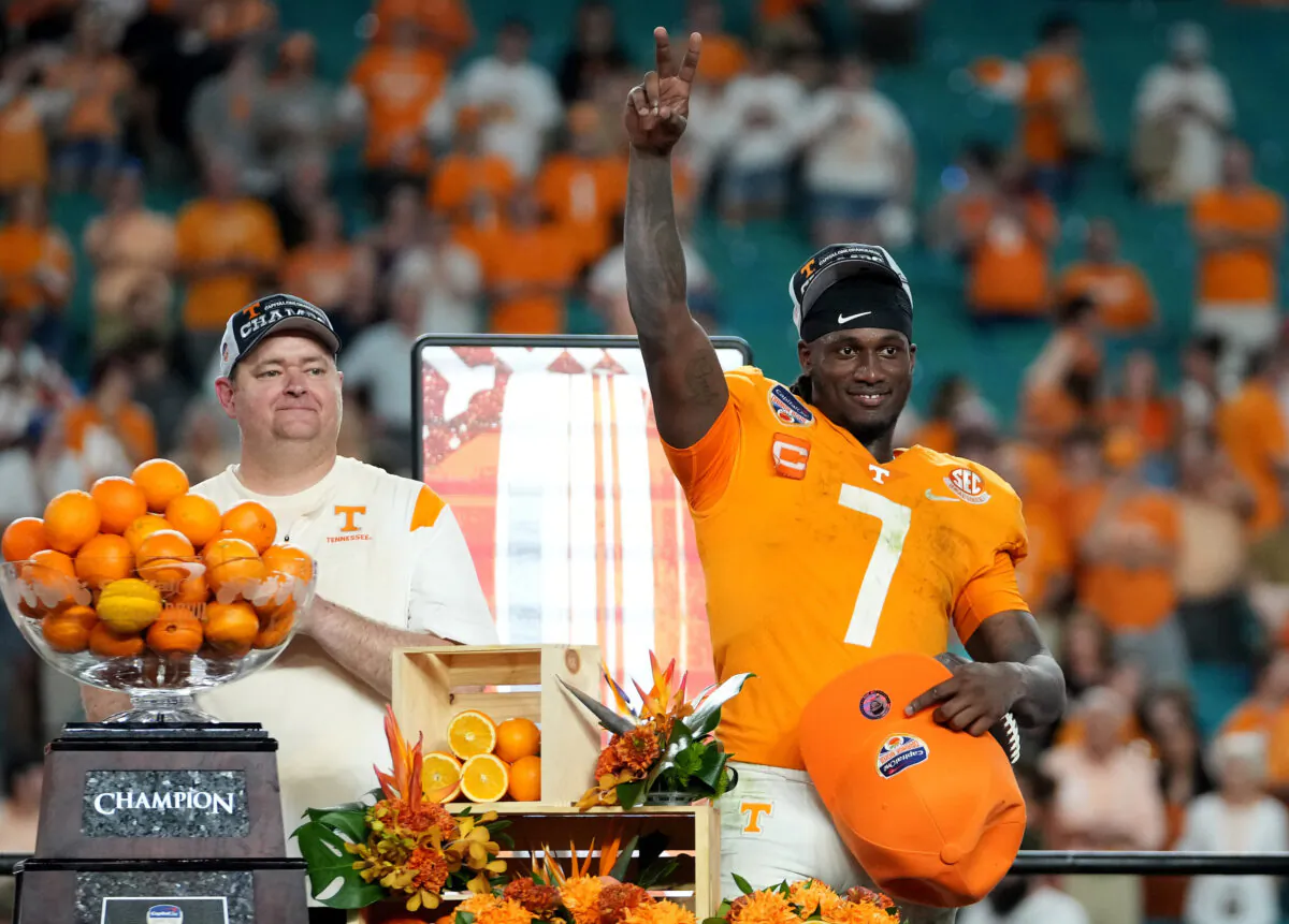 Joe Milton III (7) of the Tennessee Volunteers celebrates on stage after defeating the Clemson Tigers in the Capital One Orange Bowl at Hard Rock Stadium in Miami Gardens, Fla., on Dec. 30, 2022. (Eric Espada/Getty Images)
