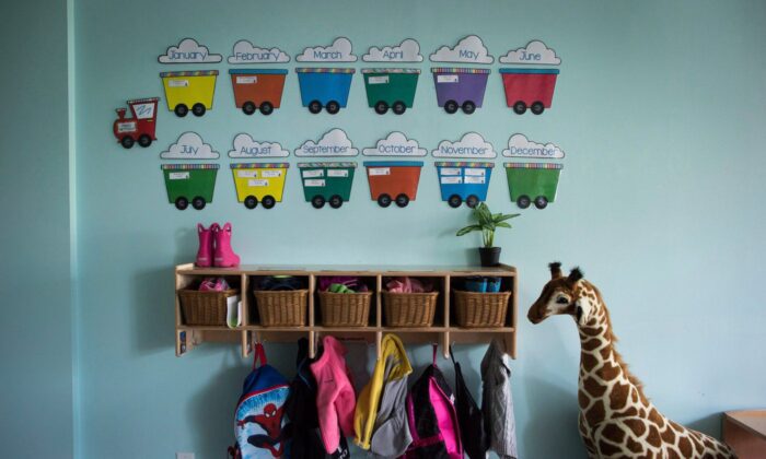 Children's backpacks and shoes are seen at a daycare franchise, in Langley, B.C., on May 29, 2018. (The Canadian Press/Darryl Dyck)
