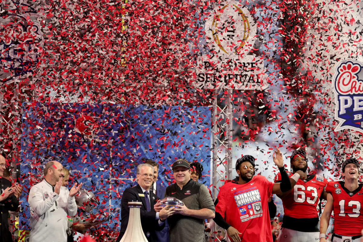 Head coach Kirby Smart of the Georgia Bulldogs celebrates with the trophy after defeating the Ohio State Buckeyes in the Chick-fil-A Peach Bowl at Mercedes-Benz Stadium in Atlanta on Dec. 31, 2022. (Carmen Mandato/Getty Images)