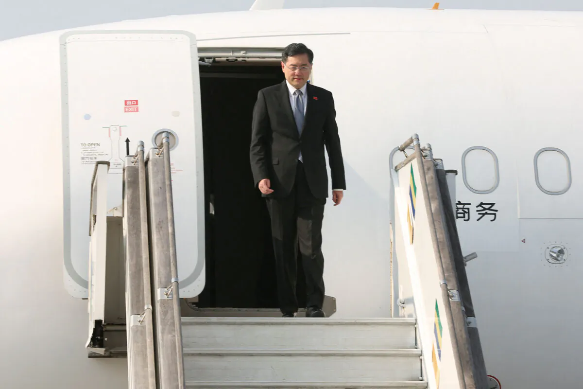 China's Minister of Foreign Affairs Qin Gang arrives at the Leon Mba International Airport in Libreville, Gabon, on Jan. 11, 2023. (Steeve Jordan/ AFP via Getty Images)