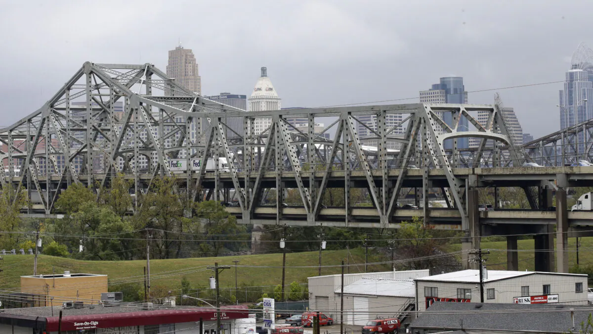 The Brent Spence Bridge on the Ohio River between Cincinnati, Ohio, and Covington, Ky., will receive a $1.64 billion boost from the $1.2 trillion Infrastructure Investment and Jobs Act (IIJA) to accelerate the $3.6 billion plan to improve the span and build a companion bridge. (AP Photo/Al Behrman)