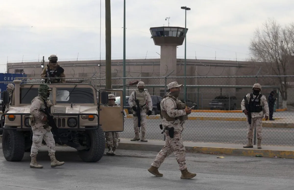 Members of the Mexican Army secure an area outside the prison of Ciudad Juarez number 3 after an attack on the prison left 14 people dead and allowed 24 inmates to escape on Jan. 1, 2023. (Herika Martinez/AFP via Getty Images)