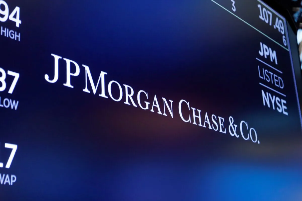 The logo for JPMorgan Chase & Co. appears above a trading post on the floor of the New York Stock Exchange in New York on Aug. 16, 2019. (Richard Drew/AP Photo)