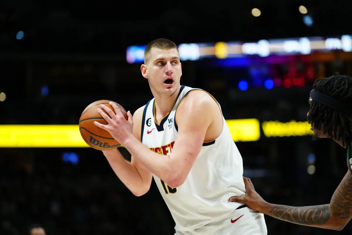 Denver Nuggets center Nikola Jokic (15) controls the ball in the second quarter against the Boston Celtics at Ball Arena in Denver on Jan. 1, 2023. (Ron Chenoy/USA TODAY Sports via Reuters)