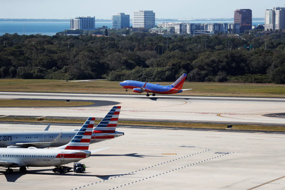 A Southwest airplane takes off at the Tampa International Airport as airports around the country are awaiting for Verizon and AT&T to rollout their 5G technology in Tampa, Fla., on Jan. 19, 2022. (Octavio Jones/Reuters)