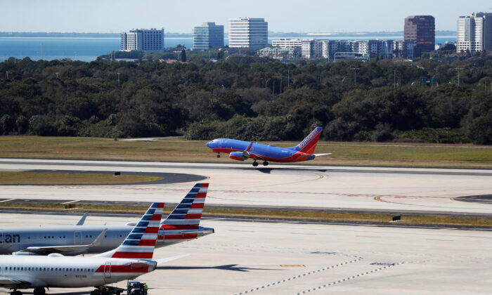 A Southwest airplane takes off at the Tampa International Airport as airports around the country are awaiting for Verizon and AT&T to rollout their 5G technology in Tampa, Fla., on Jan. 19, 2022. (Octavio Jones/Reuters)