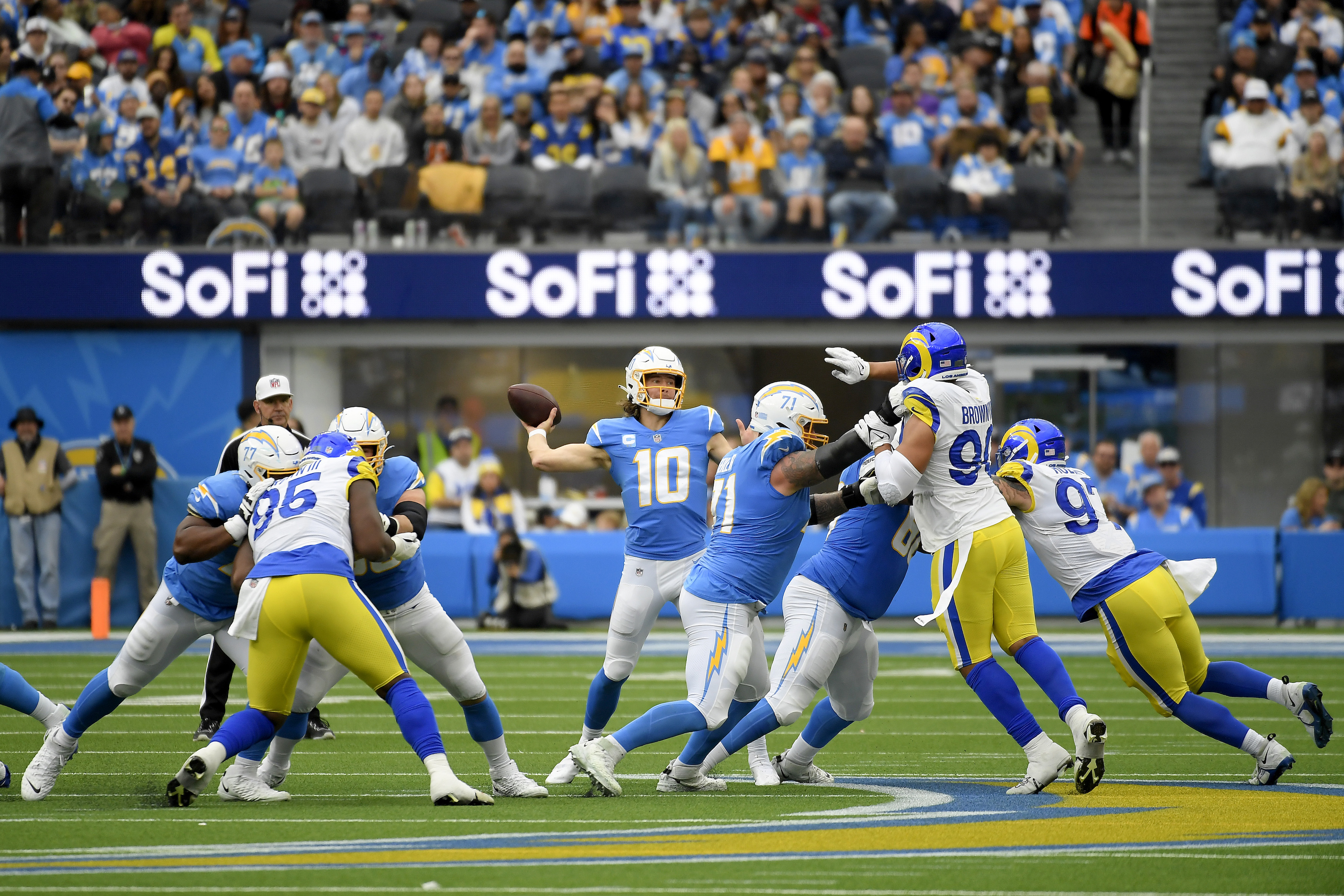 Chargers tackle Rams in SoFi's first game with fans