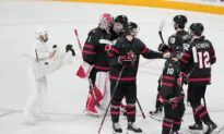 Camouflaged Cameraman a Hit at World Juniors: ‘I Have the Best Seat in the House’