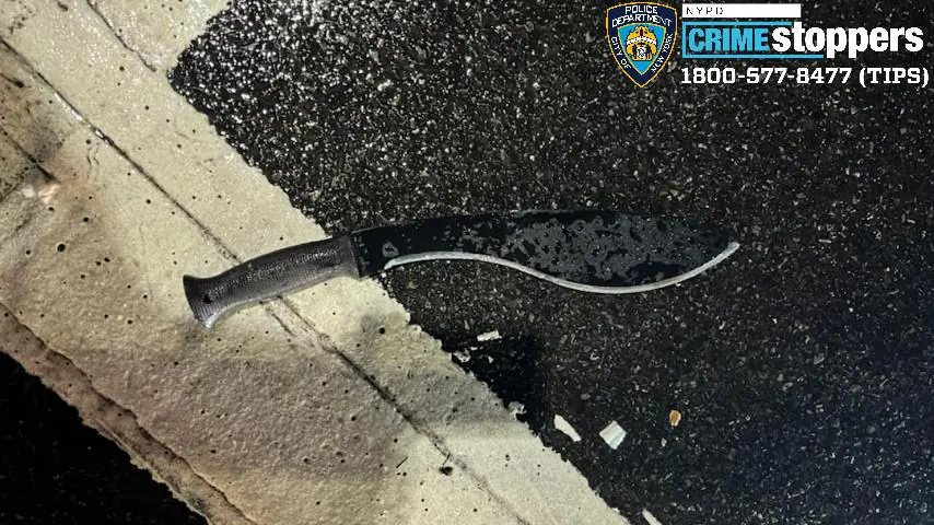 Police officers recovered the machete used in the New Year's Eve attack. (NYPD via The Epoch Times)