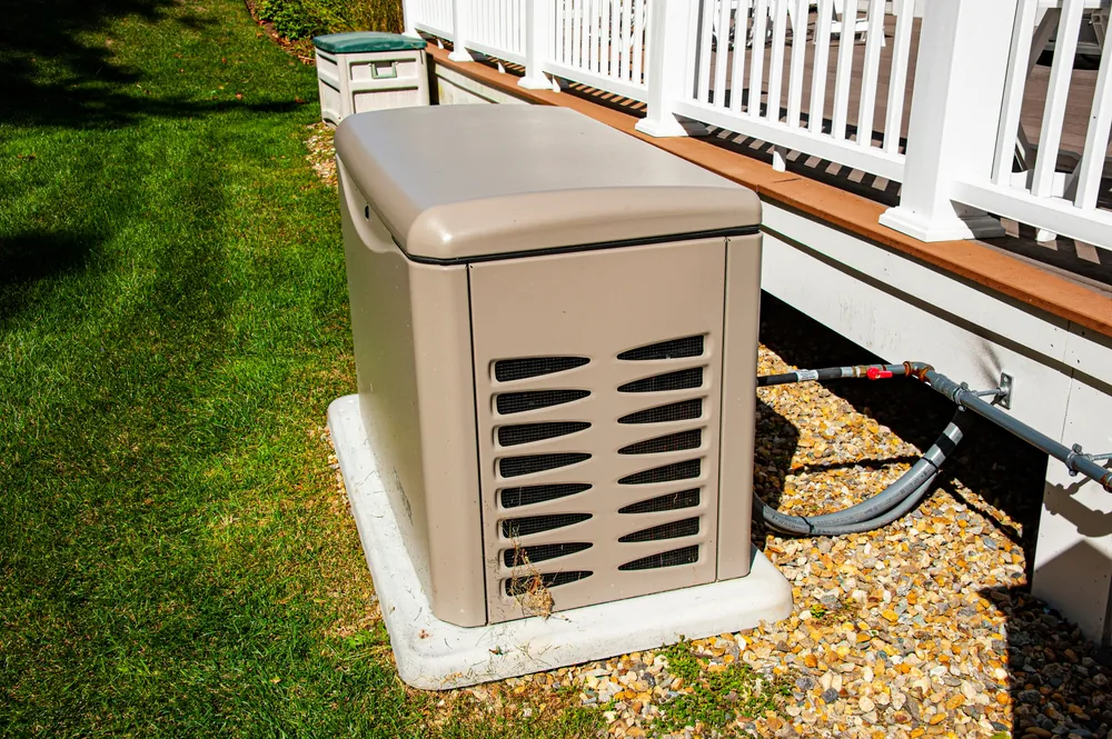 A home generator is a large unit that kicks in mere seconds after the power goes out, providing a constant, reliable power source.(Steven Phraner/Shutterstock)
