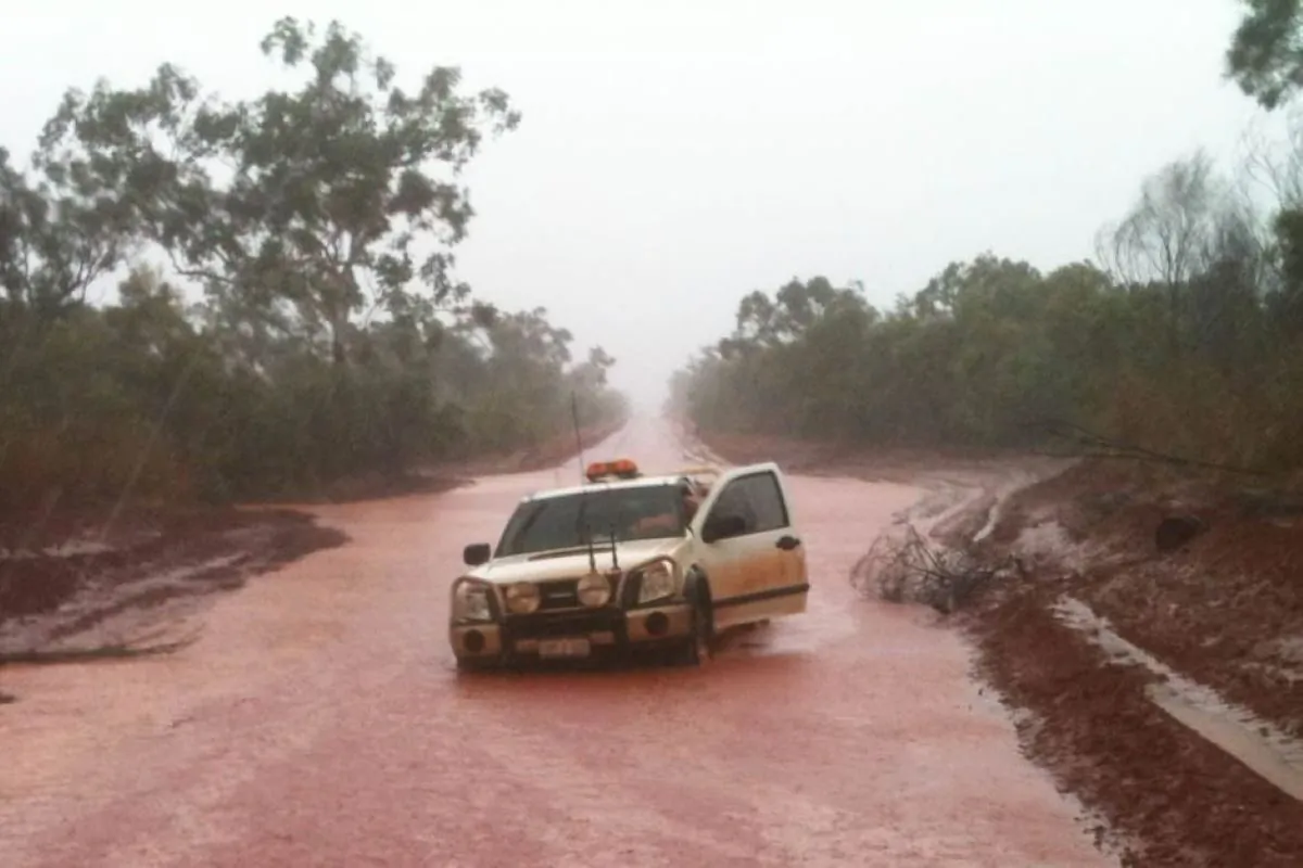 Supplied image obtained Tuesday, Feb 7, 2017 of flooded roads in WA's northern regions. Officers from the Pilbara and Kimberley Districts have warned people of the dangers of trying to drive through floodwaters after a space of emergency rescues in the past week. (AAP Image/WA Police)