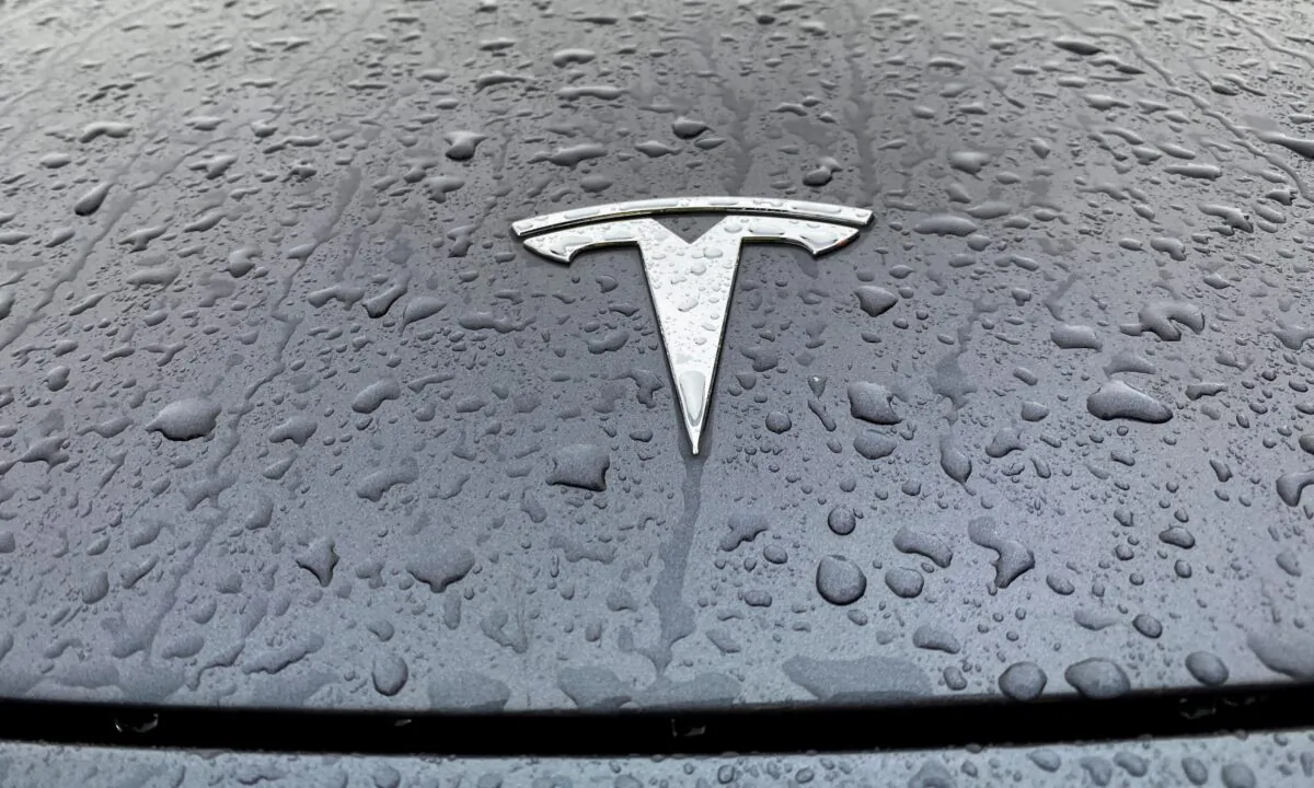 Tesla logo on the hood of a car in Oslo, Norway, on Nov. 10, 2022. (Victoria Klesty/Reuters)