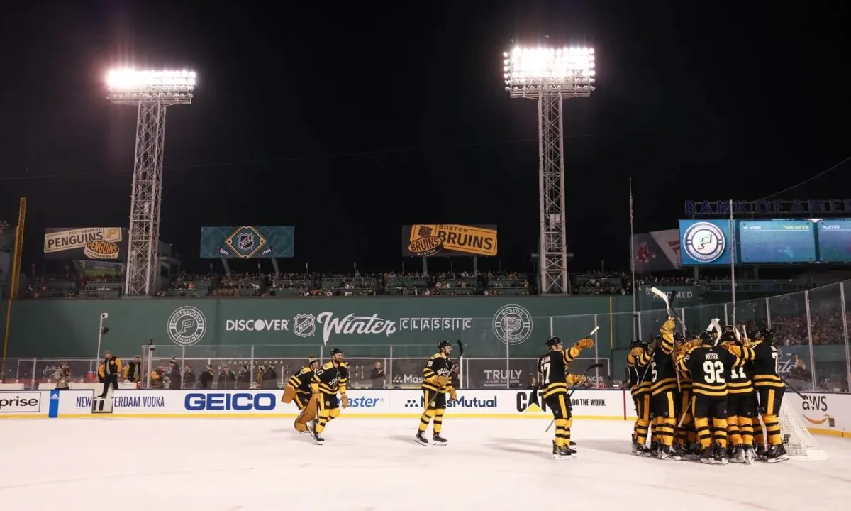 The Boston Bruins celebrates after defeating the Pittsburgh Penguins during the 2023 Winter Classic ice hockey game at Fenway Park in Boston on Jan. 2, 2023. (Paul Rutherford-USA TODAY Sports via Field Level Media)