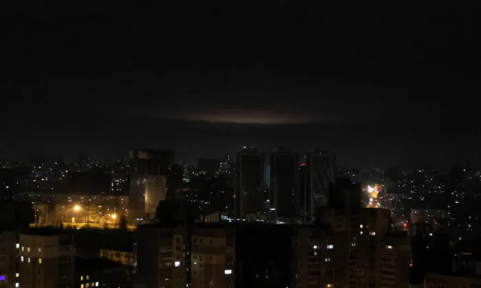 A glow from explosion is seen over the city's skyline during a Russian drones strike, amid Russia's attack on Ukraine in Kyiv on Jan. 1, 2023. (Gleb Garanich/Reuters)