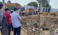 Rescuers Try to Save 10-Year-Old Boy Trapped in Concrete Hole in Vietnam