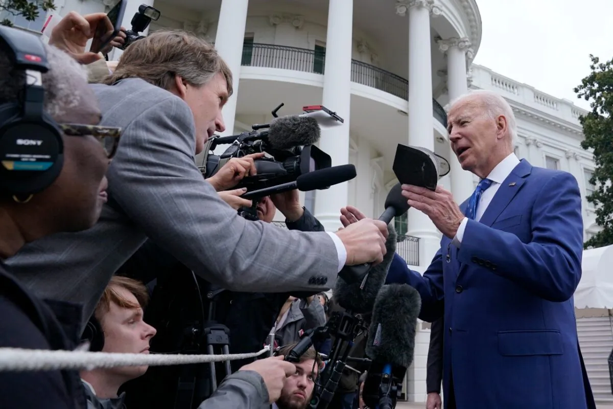 President Joe Biden talks with reporters outside of the White House in Washington on Jan. 4, 2023, before boarding Marine One on the South Lawn. (AP Photo/Susan Walsh)