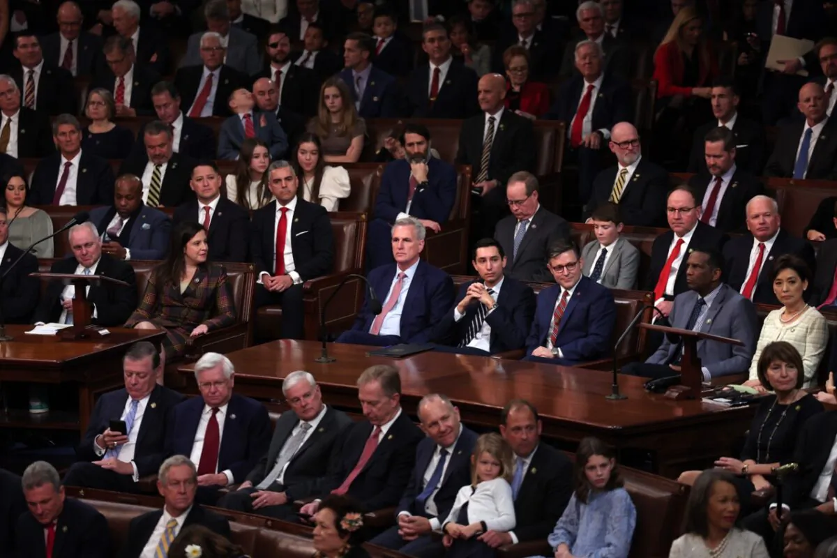 Then House Minority Leader Kevin McCarthy (R-Calif.) (C) sits alongside colleagues as Representatives cast their votes for Speaker of the House on the first day of the 118th Congress in the House Chamber of the U.S. Capitol Building in Washington on Jan. 3, 2023. (Win McNamee/Getty Images)
