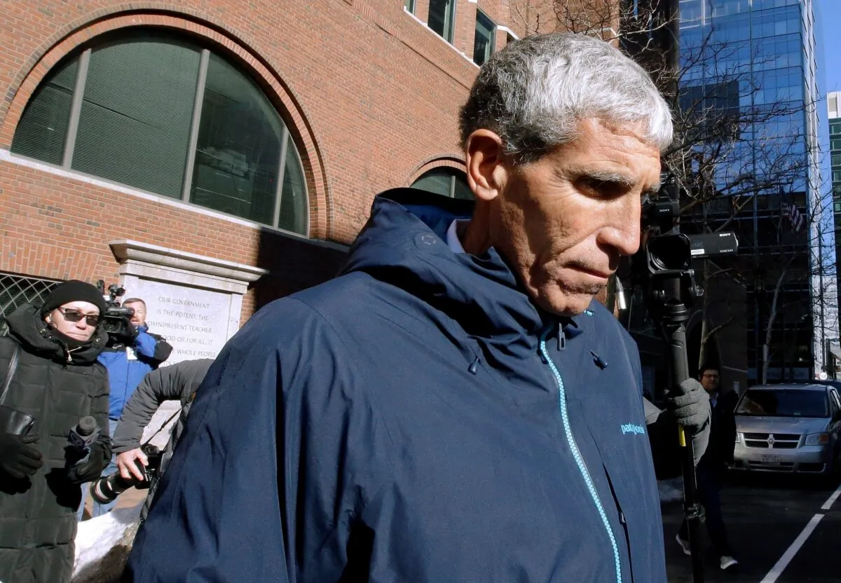 William "Rick" Singer founder of the Edge College & Career Network, departs federal court in Boston on March 12, 2019. (Steven Senne/AP Photo)