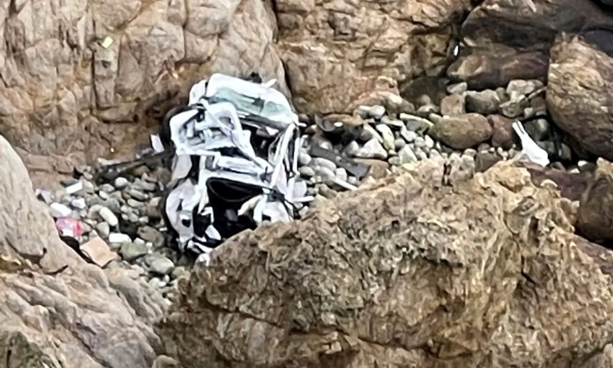 A Tesla vehicle that plunged off a Northern California cliff along the Pacific Coast Highway, on Jan. 2, 2023. (San Mateo County Sheriff's Office via AP)