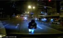 Man Who Threw Himself Onto Moving Car Arrested on Suspected Fraud