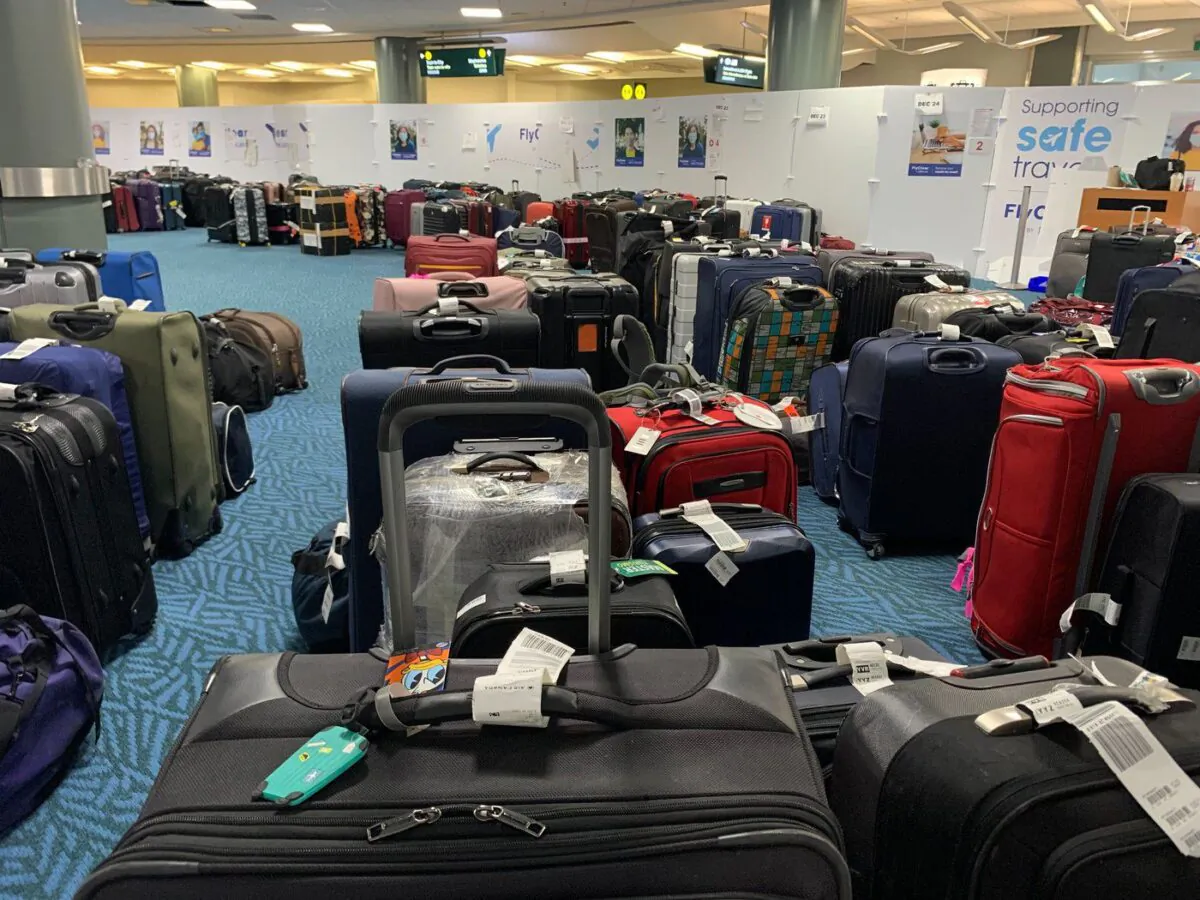 Unclaimed checked bags are shown at the Vancouver International Airport on Jan. 3, 2023. (The Canadian Press/Brenna Owen)