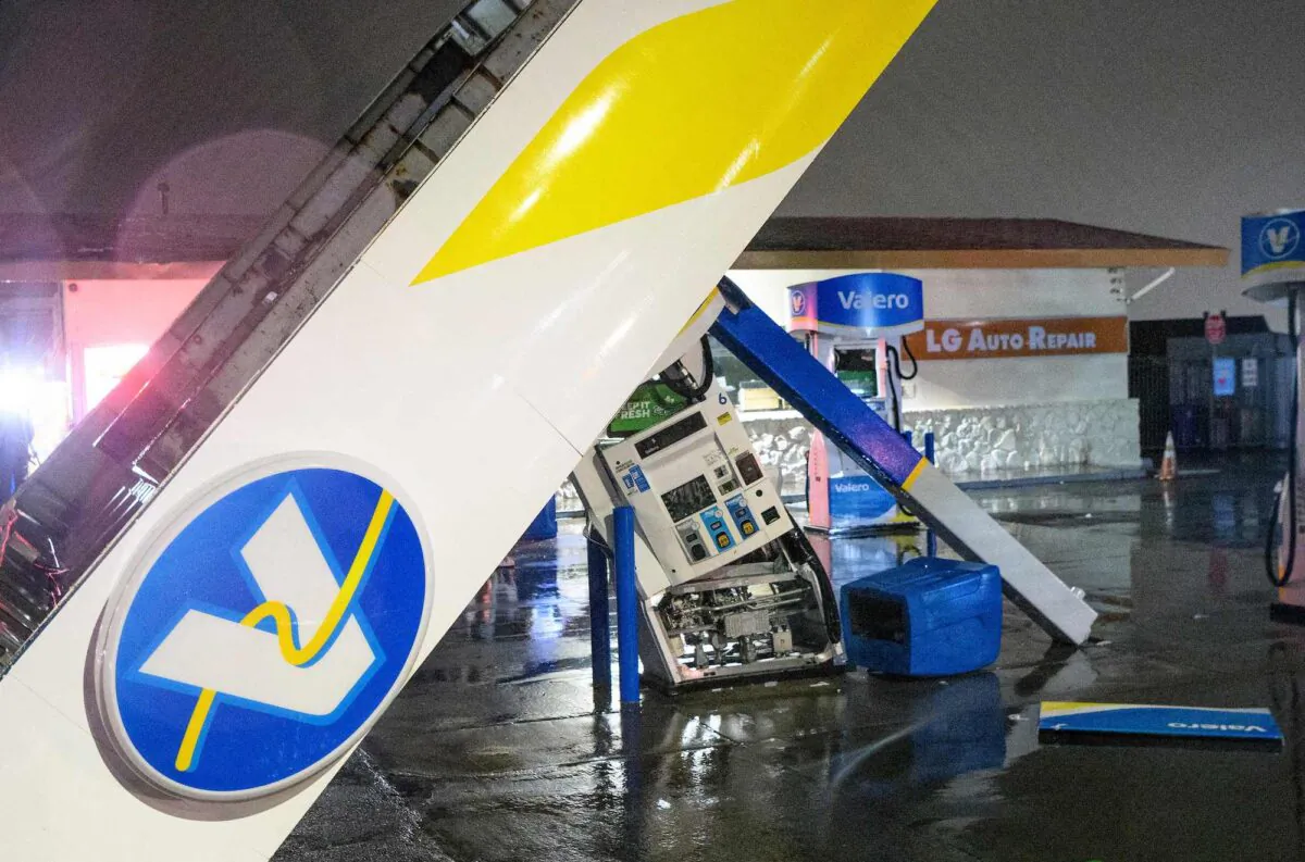 A damaged Valero gas station creaks in the wind during a massive "bomb cyclone" rain storm in South San Francisco, Calif. on Jan. 4, 2023. (Josh Edelson/AFP/Getty Images)