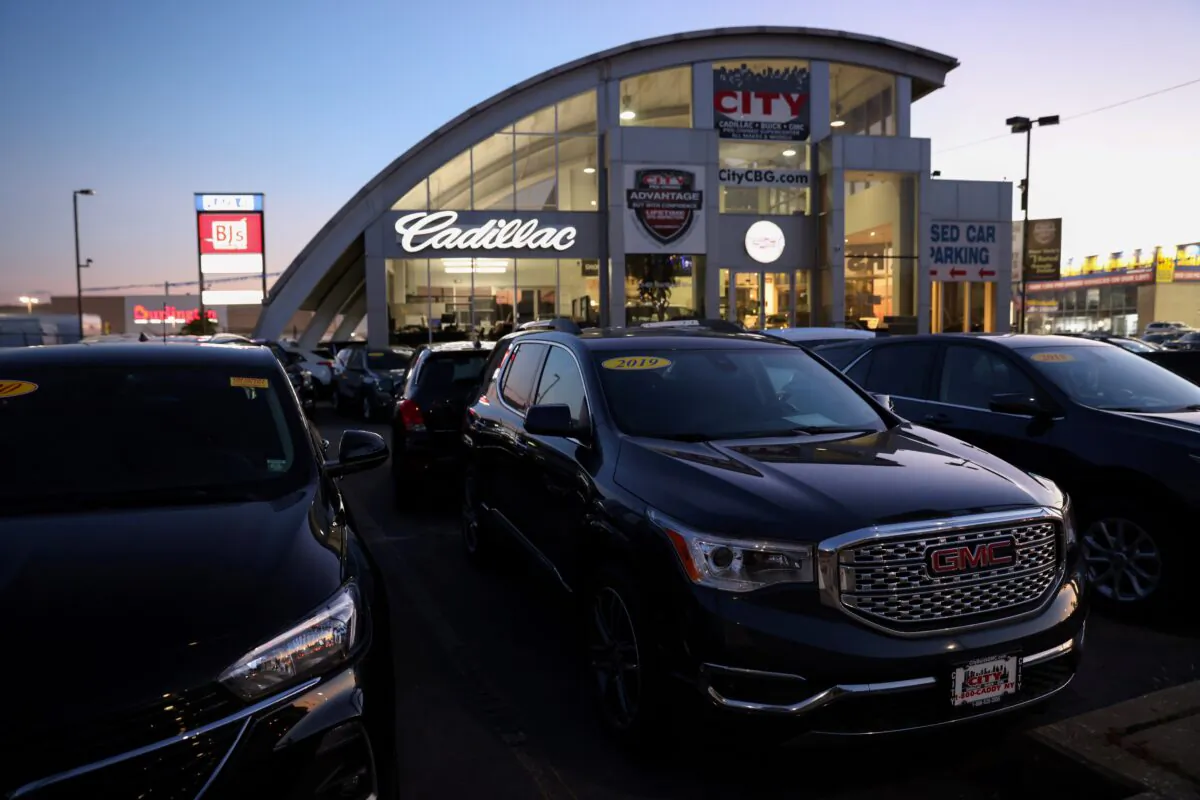 Vehicles of automobile brands belonging to General Motors Company at a car dealership in Queens, N.Y., on Nov. 16, 2021. (Andrew Kelly/Reuters)