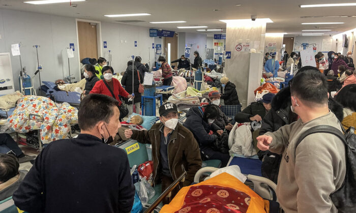 Patients on stretchers are seen at Tongren hospital in Shanghai on Jan. 3, 2023. (Hector Retamal/AFP via Getty Images)