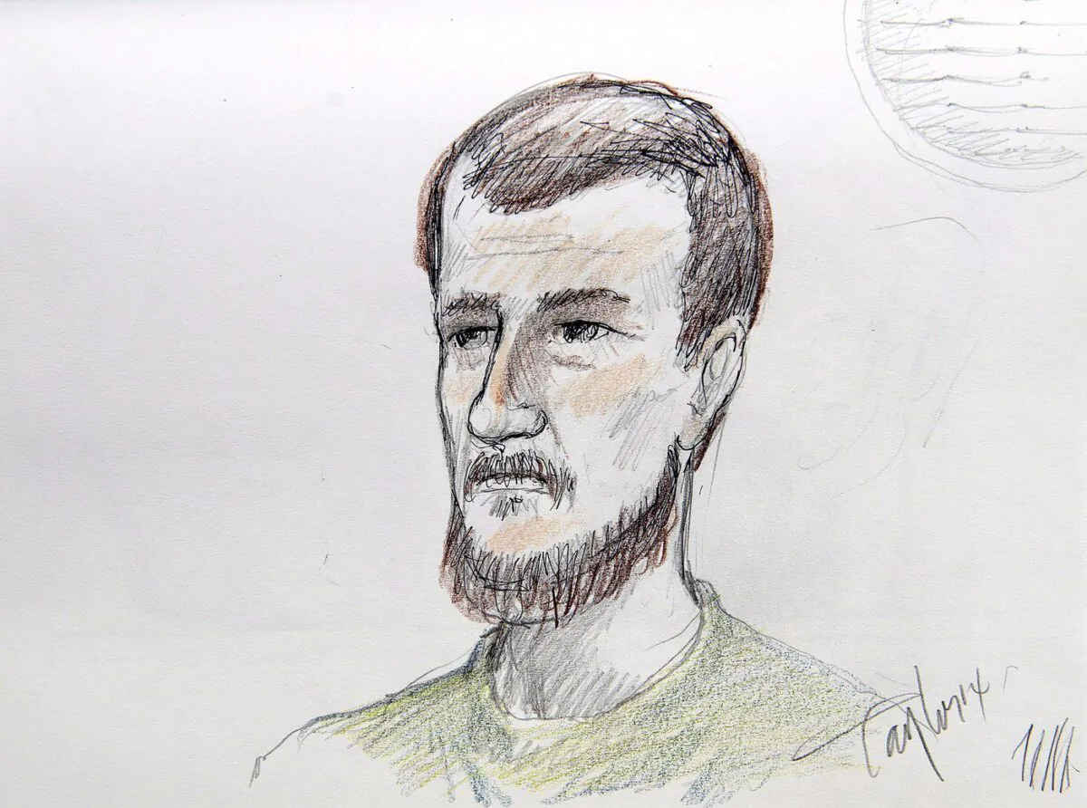 Justin Bourque is depicted in an artist's sketch at his sentencing hearing at Moncton Law Courts in Moncton, N.B. on Oct. 28, 2014. (The Canadian Press/Carol Taylor)