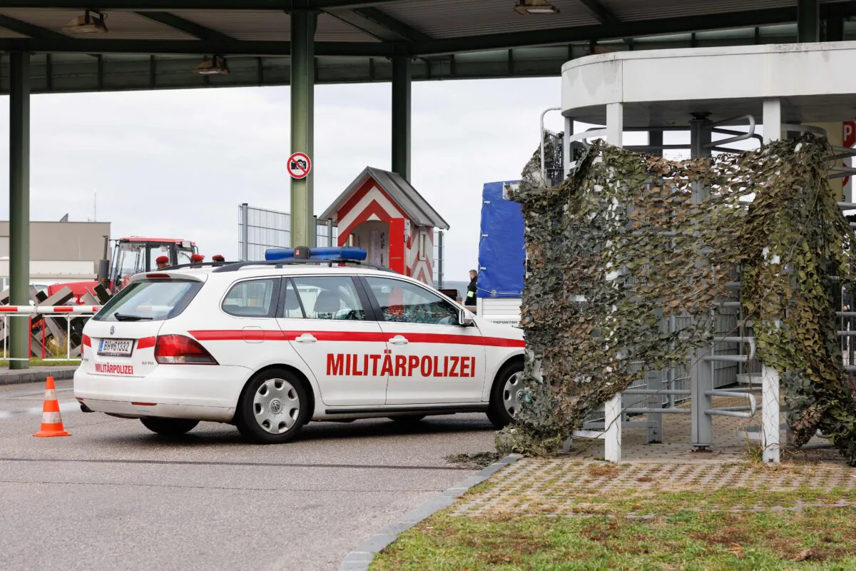 Forensic experts of the police investigate the site of a shooting at the Flugfeld Kaserne barracks in Wiener Neustadt, Austria, on Jan. 6, 2023. (Florian Wieser/APA/AFP via Getty Images)
