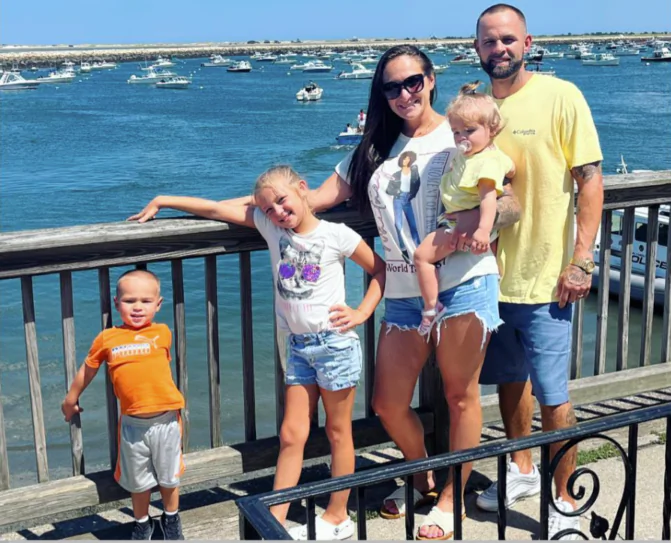 Nursing student Brittany Woolery with her husband and their three kids. Woolery cannot complete nursing school because she was denied a religious exemption from a COVID-shot mandate. (Courtesy of Brittany Woolery)