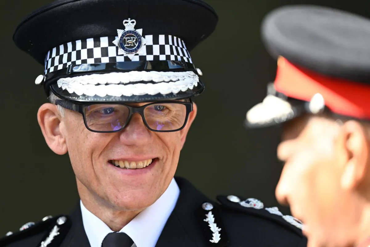 Metropolitan Police Commissioner Mark Rowley smiles during a visit from Britain's King Charles III to thank Emergency Service workers at Lambeth HQ in London on Sept. 17, 2022. (Carl de Souza - WPA Pool/Getty Images)