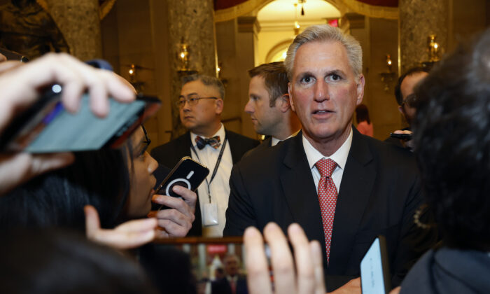 U.S. House Republican Leader Kevin McCarthy (R-Calif.) talks to reporters as he leaves the House Chamber during the third day of elections for Speaker of the House at the U.S. Capitol in Washington on Jan. 5, 2023. (Tasos Katopodis/Getty Images)